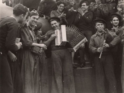 Marines-playing-musical-instruments-on-board-the-Battleship-Jaime-I,-Almería,-Spain,-1937,-Gerda-Taro
